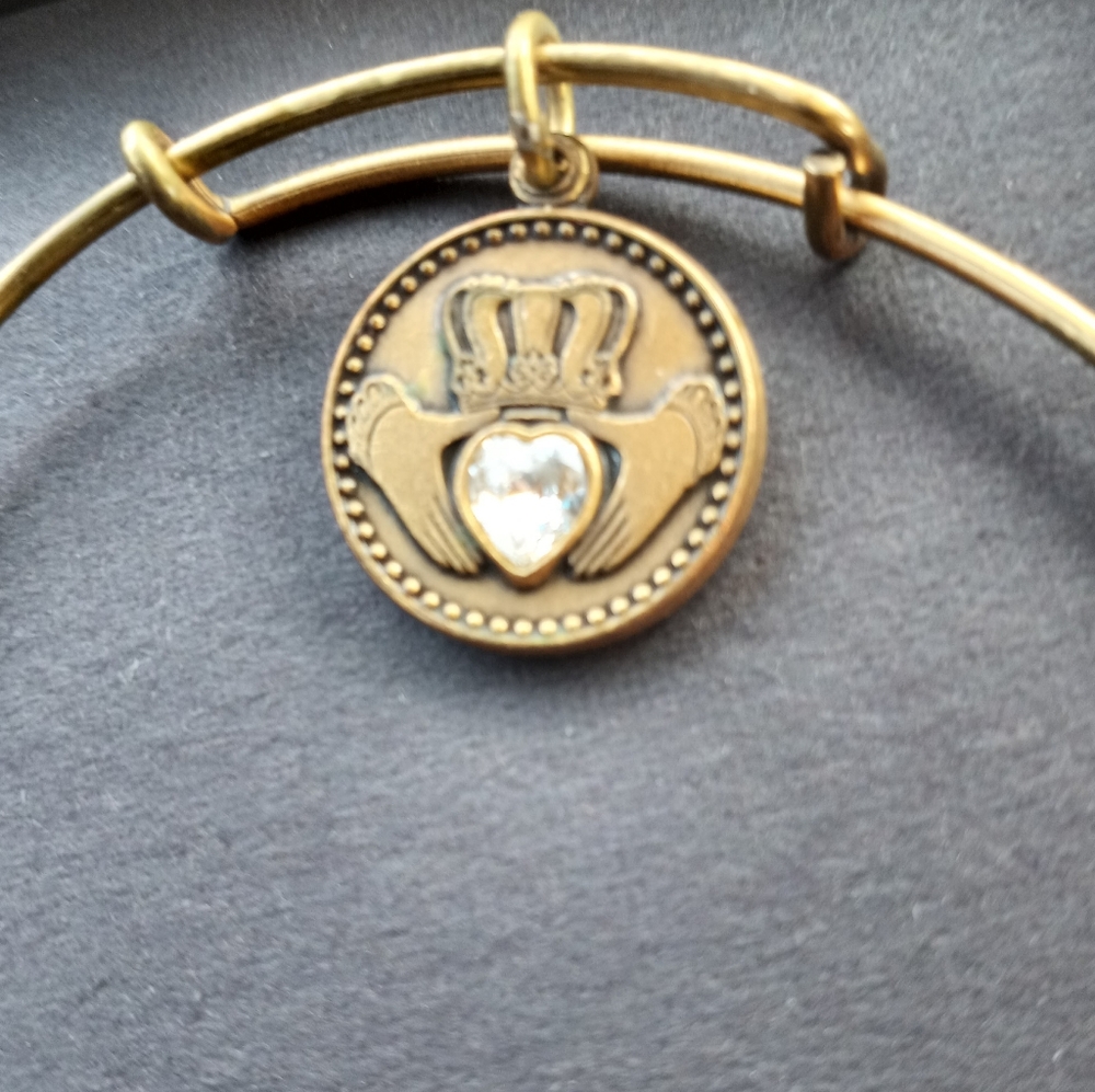 Alex and Ani Gold Bracelet with Claddah Charm.
